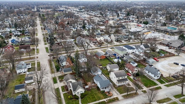 birds eye view of property with a residential view