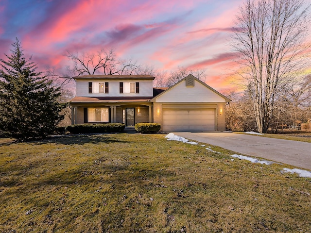 traditional home featuring driveway, a porch, a lawn, and an attached garage