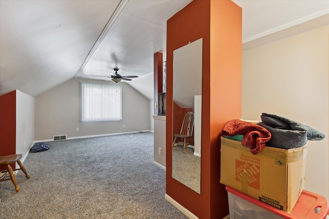 bonus room with lofted ceiling, carpet, visible vents, and baseboards