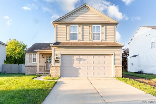 view of front of home with a garage, brick siding, concrete driveway, fence, and a front yard