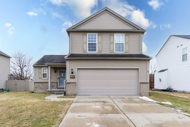 view of front facade with a garage, a front lawn, concrete driveway, and brick siding