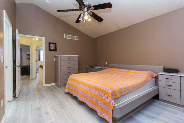 bedroom with lofted ceiling, light wood-style floors, ceiling fan, and visible vents