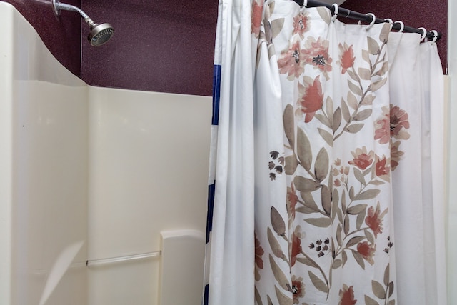 bathroom with a shower with curtain