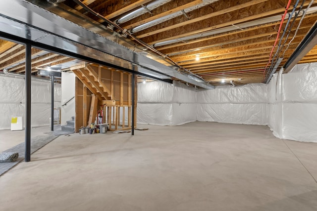 unfinished basement with stairway