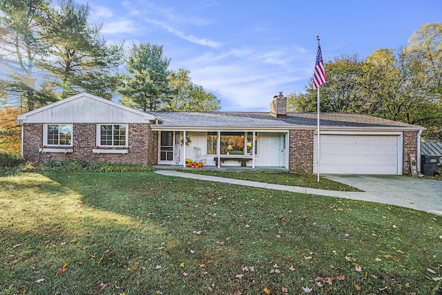 ranch-style house featuring driveway, a chimney, an attached garage, a front lawn, and brick siding