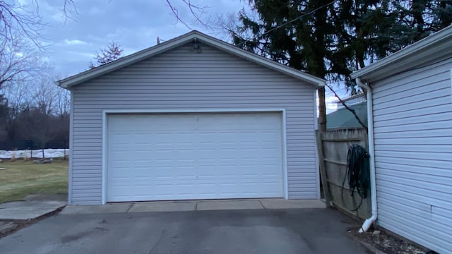 detached garage with fence