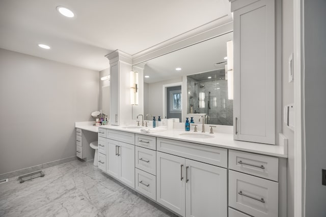 bathroom featuring marble finish floor, double vanity, a sink, and a shower stall