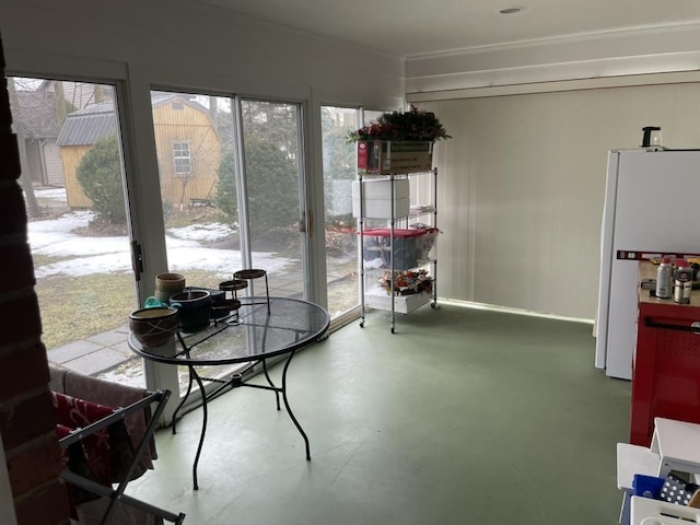 dining room featuring concrete floors