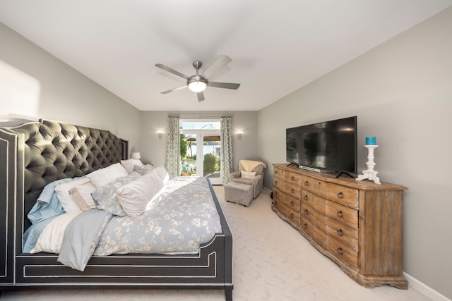 carpeted bedroom with baseboards and a ceiling fan