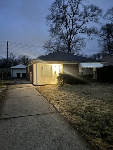 view of property exterior featuring an outdoor structure