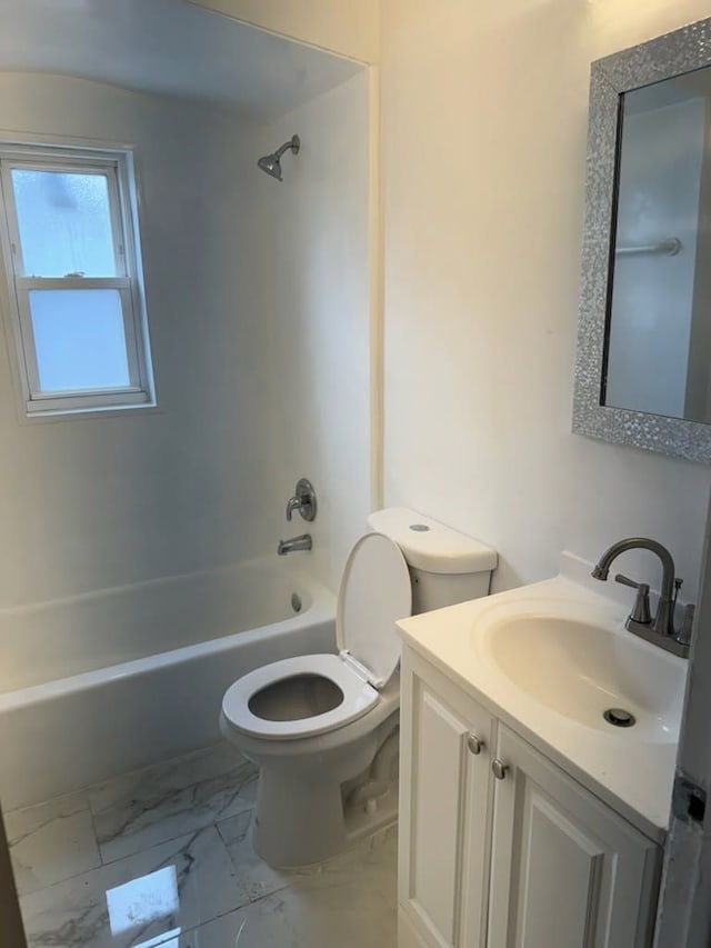 bathroom with shower / washtub combination, marble finish floor, vanity, and toilet