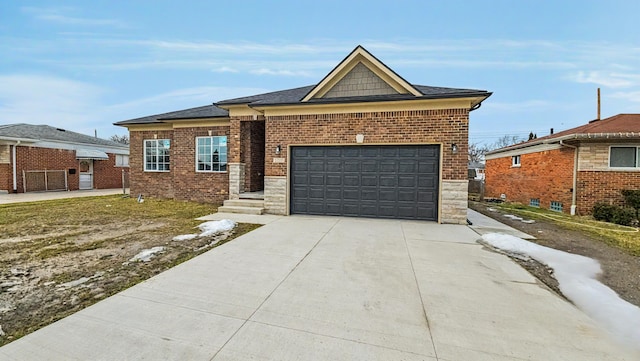 view of front of house with a shingled roof, brick siding, driveway, and an attached garage