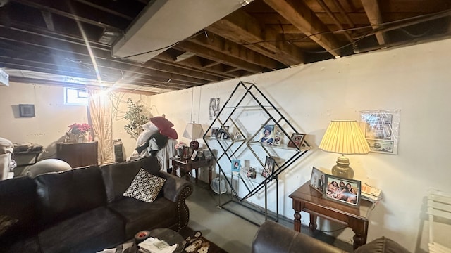 living room featuring finished concrete flooring