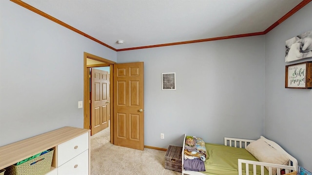 bedroom with baseboards, ornamental molding, and light colored carpet