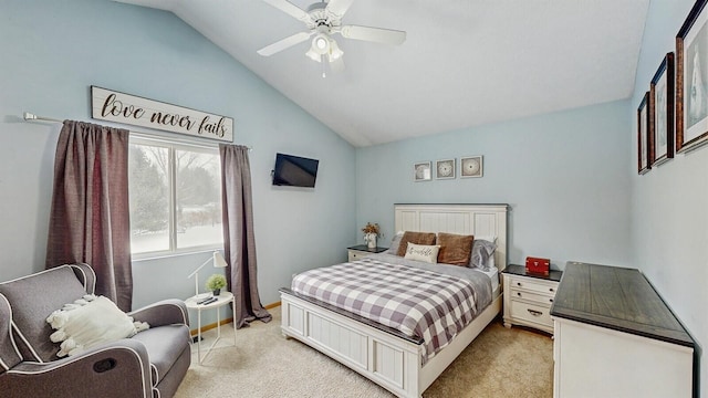 bedroom with baseboards, vaulted ceiling, a ceiling fan, and light colored carpet