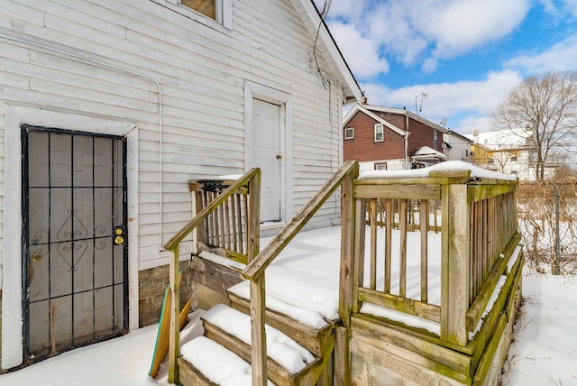 view of snow covered deck