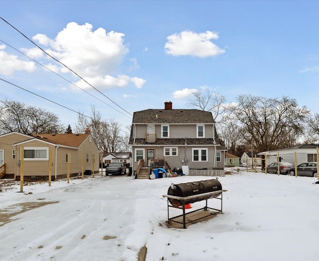 view of snow covered property