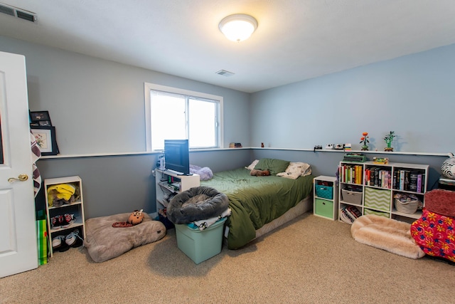 carpeted bedroom with visible vents