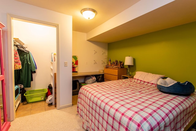 tiled bedroom with carpet floors