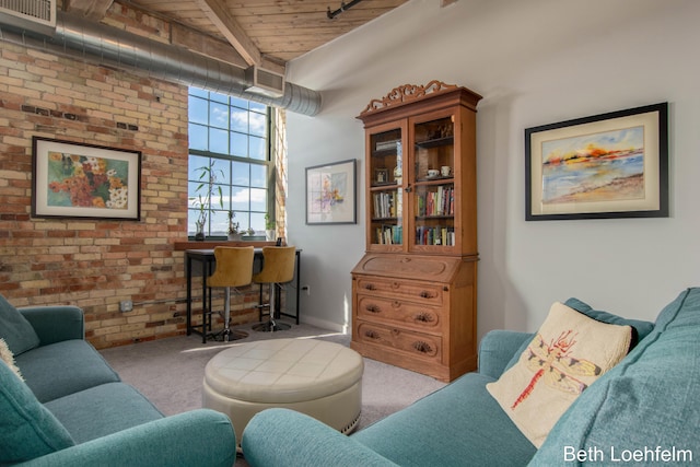 carpeted living area featuring wooden ceiling, visible vents, and brick wall