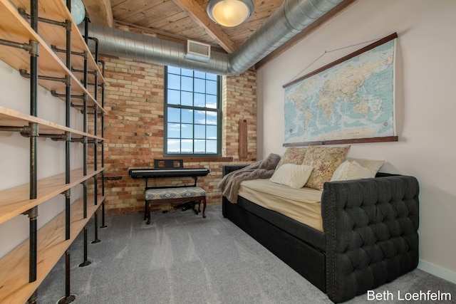 carpeted bedroom featuring wooden ceiling, brick wall, and visible vents