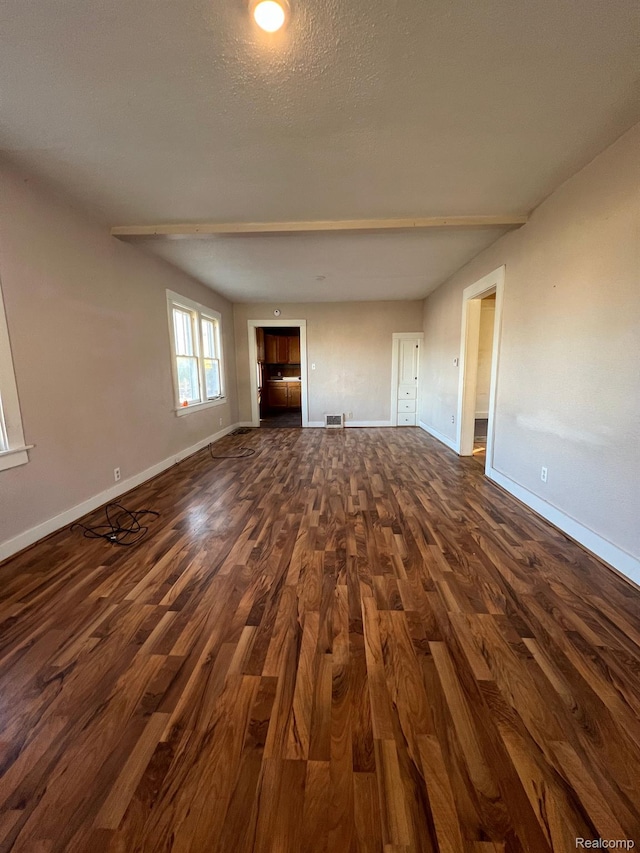 1517 Stanley St, Saginaw, MI 48602 - unfurnished room featuring dark wood-style flooring and baseboards