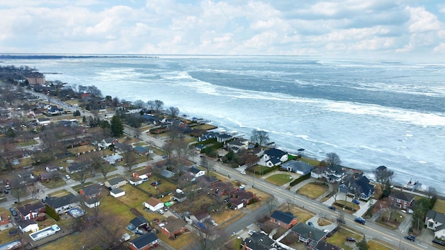 aerial view featuring a residential view and a water view