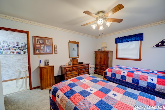 bedroom with ceiling fan, baseboards, and light colored carpet