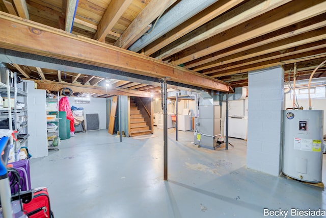 unfinished basement with water heater, washer / clothes dryer, stairs, and heating unit