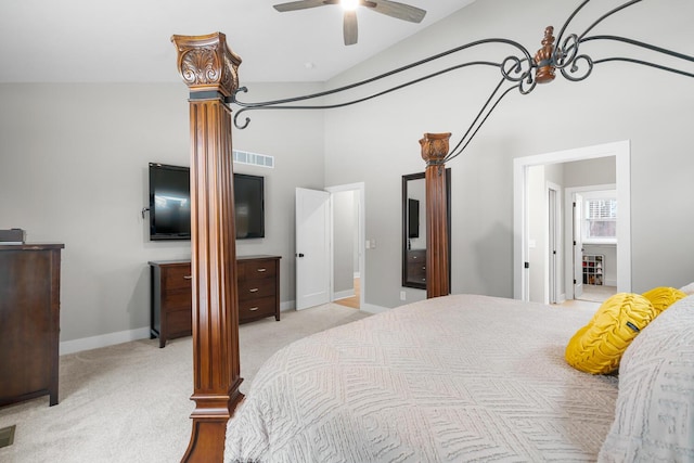 bedroom featuring baseboards, a ceiling fan, carpet flooring, ornate columns, and high vaulted ceiling