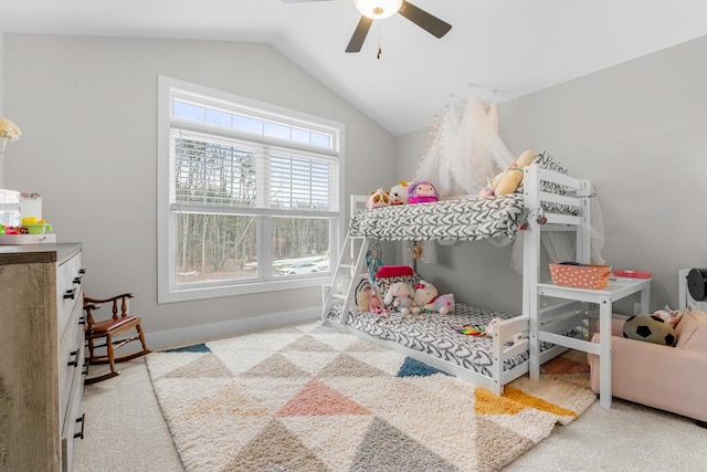 carpeted bedroom featuring lofted ceiling, ceiling fan, and baseboards