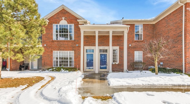 view of front of property with brick siding