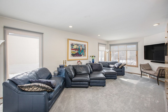 living area featuring carpet flooring and recessed lighting