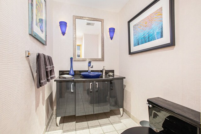 bathroom with tile patterned floors, vanity, and visible vents