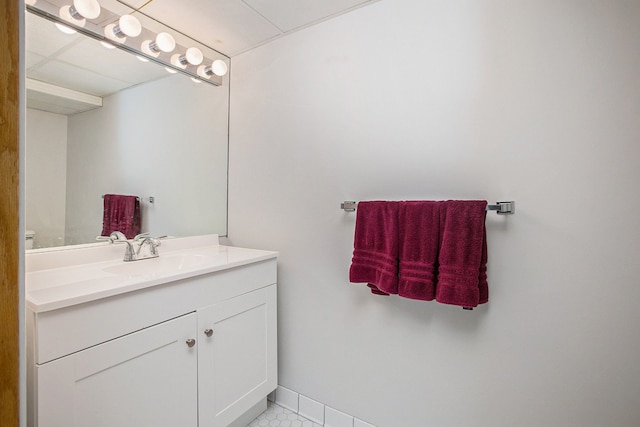 bathroom featuring vanity and baseboards