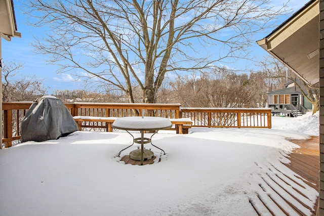 view of snow covered deck
