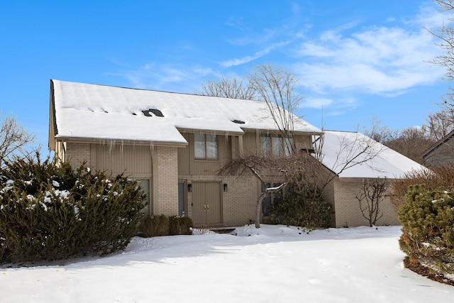 view of front facade featuring brick siding