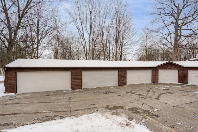 view of snow covered garage