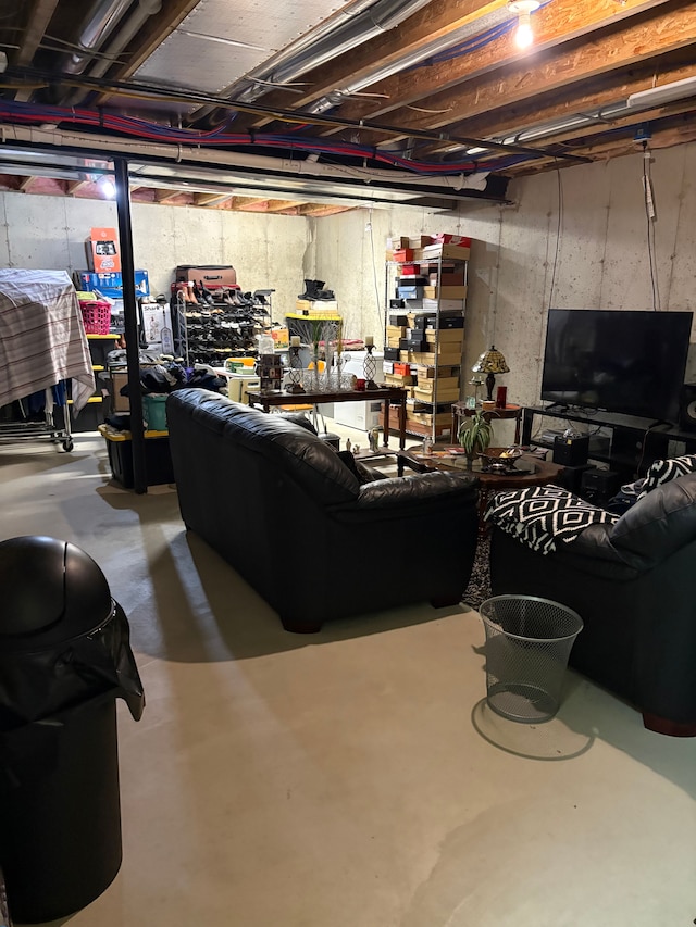 living room with concrete flooring