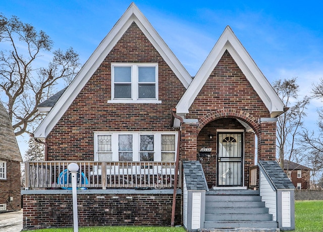 tudor house with brick siding