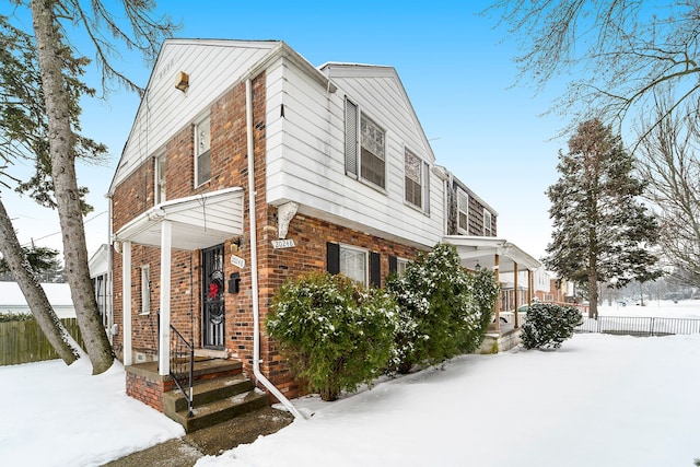 20248 Regent Dr, Detroit, MI 48205 - view of front facade with fence and brick siding