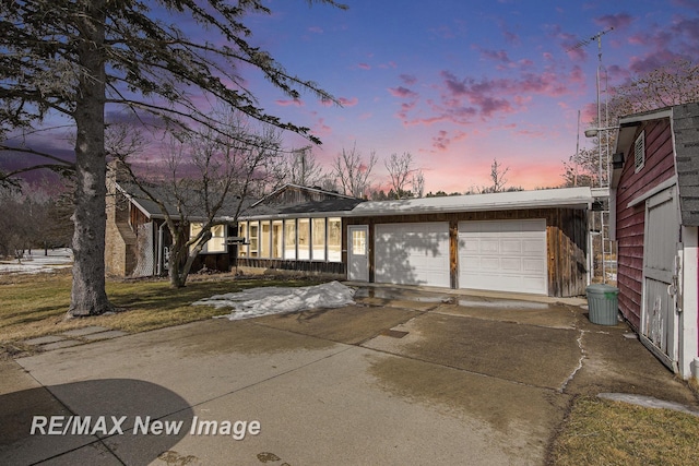 view of front of house featuring a garage and driveway