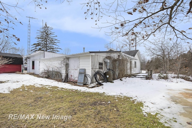 view of snow covered property