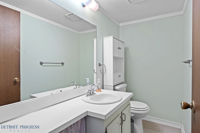 bathroom with toilet, vanity, baseboards, tile patterned floors, and crown molding