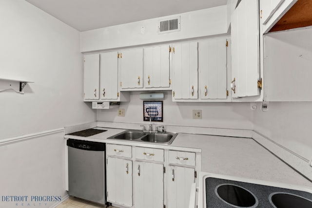 kitchen with a sink, visible vents, white cabinets, light countertops, and dishwasher