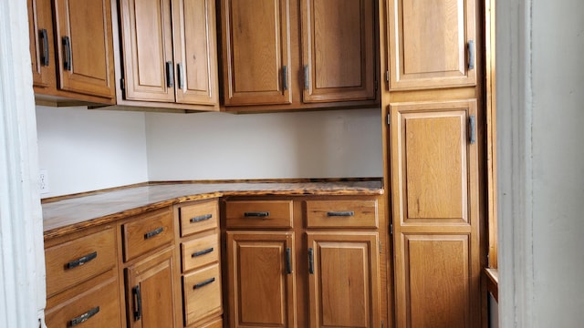 kitchen with brown cabinetry