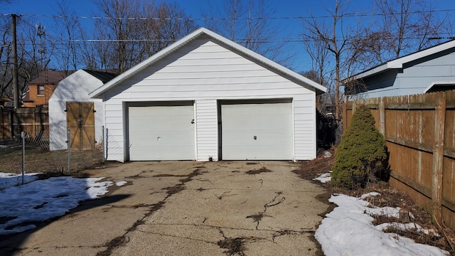 detached garage with fence