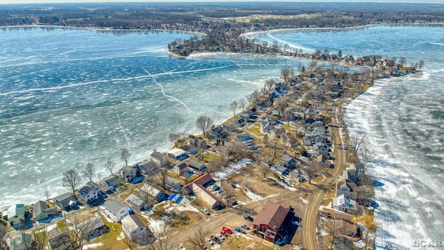 bird's eye view featuring a residential view and a water view