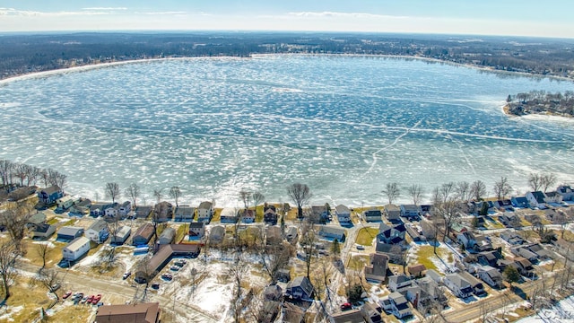 birds eye view of property with a residential view and a water view