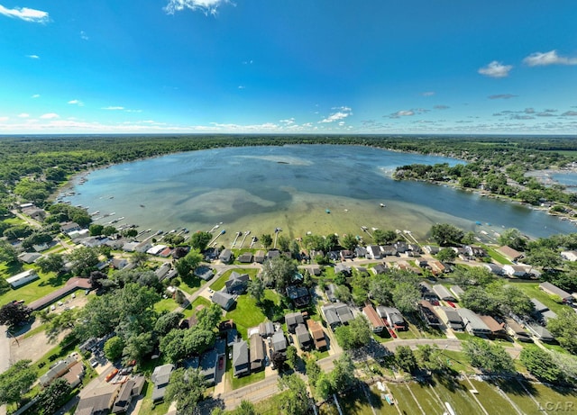 birds eye view of property featuring a water view and a residential view